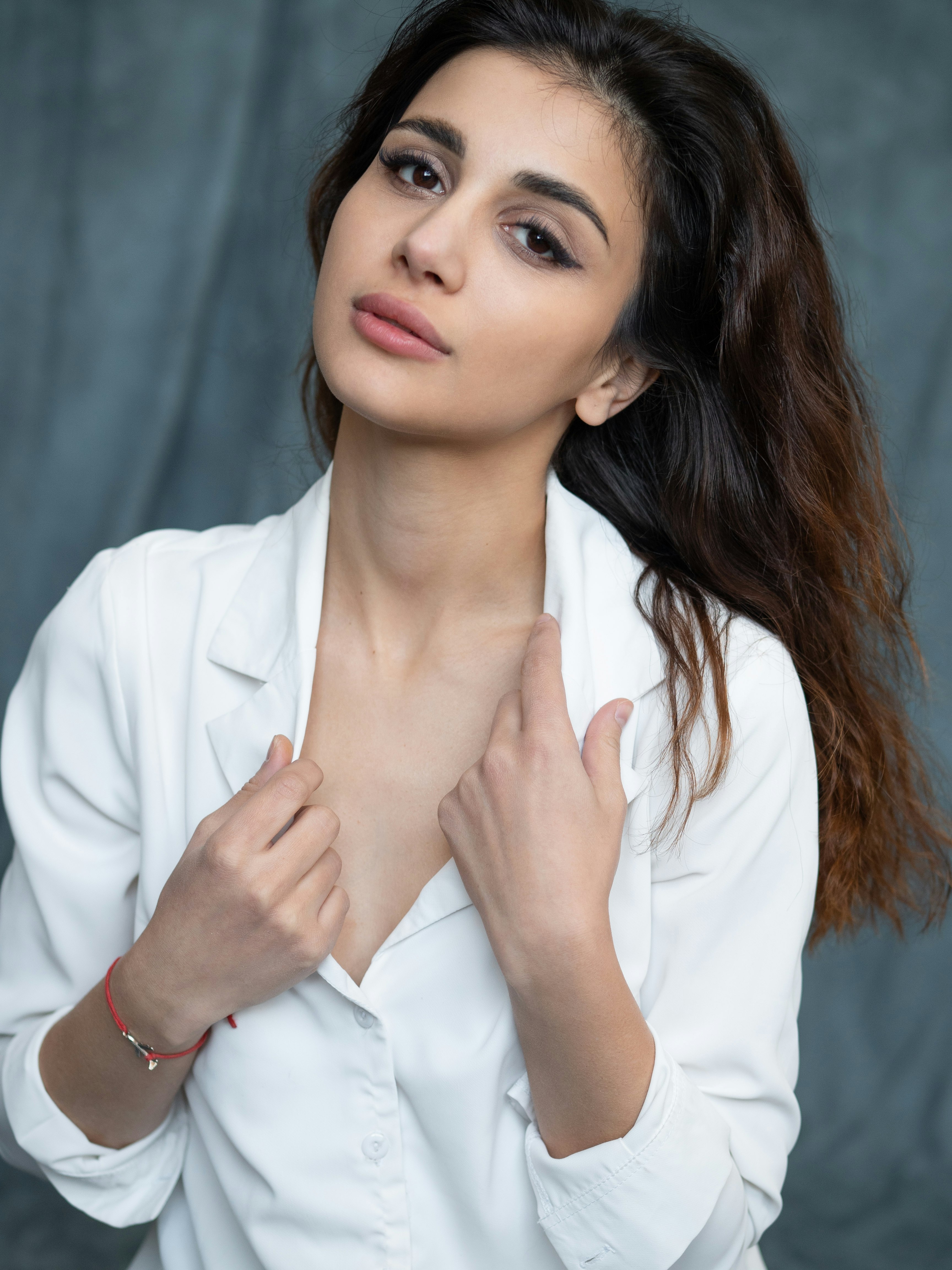 woman in white button up shirt